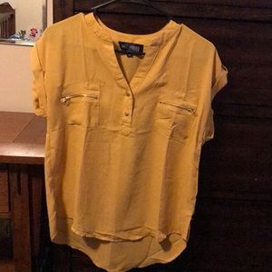Mustard blouse Sized M. No rips/tears.